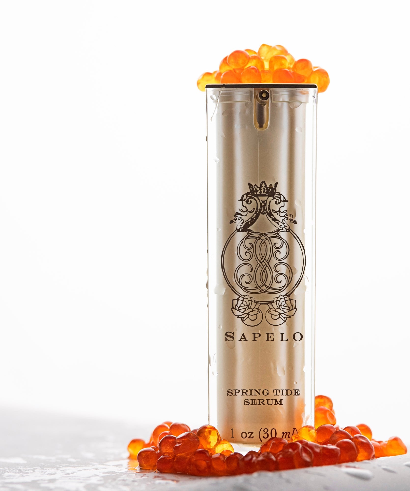 Sappelo Spring Tide Serum bottle with red arctic caviar on a white background