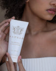 Model with Sapelo Skin Care Natural Seaweed Face Cleanser