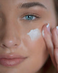 Model with Sapelo Skin Care Renewing Serum & Rejuvenating Cream