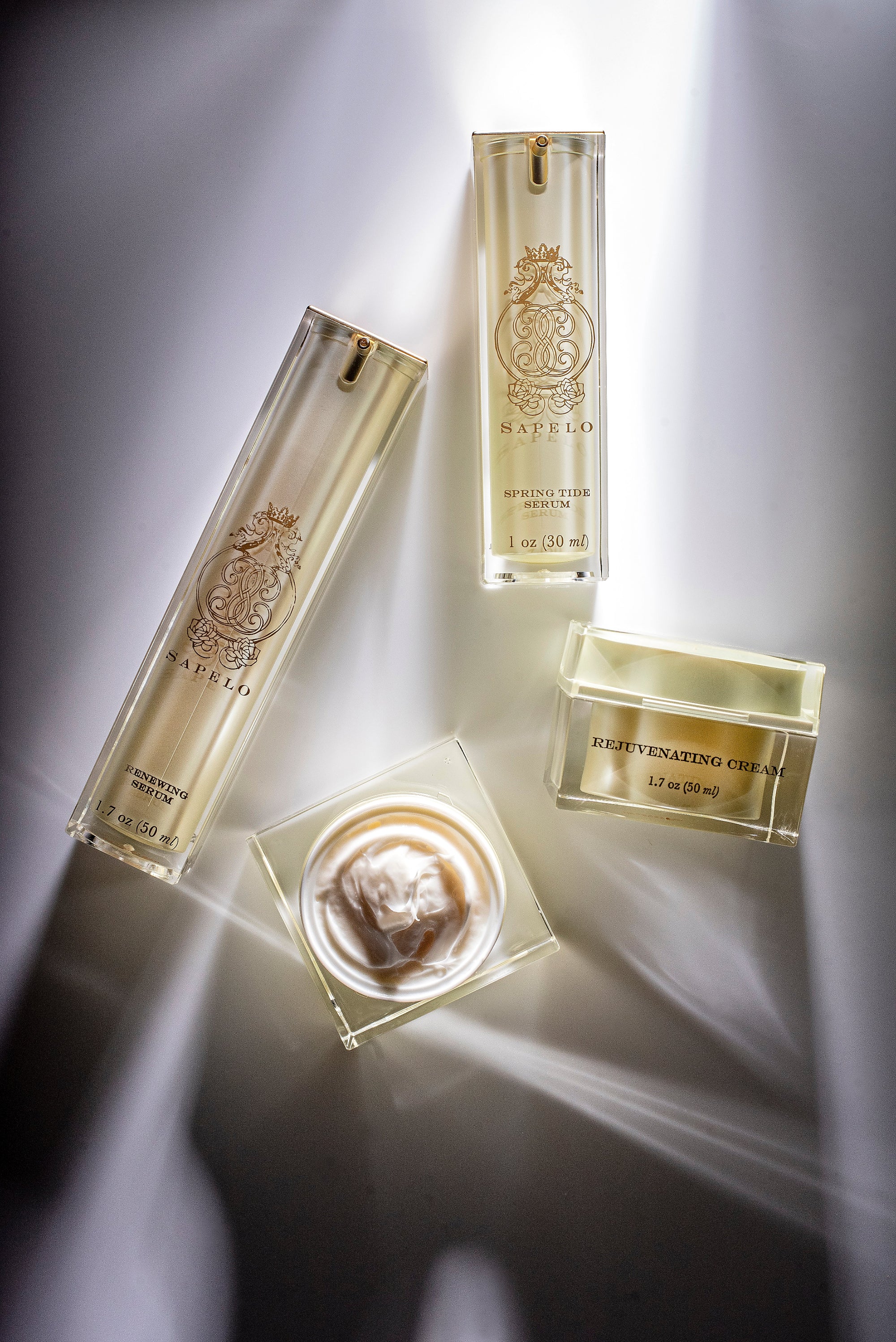 Skincare products with a brand logo on a gray background