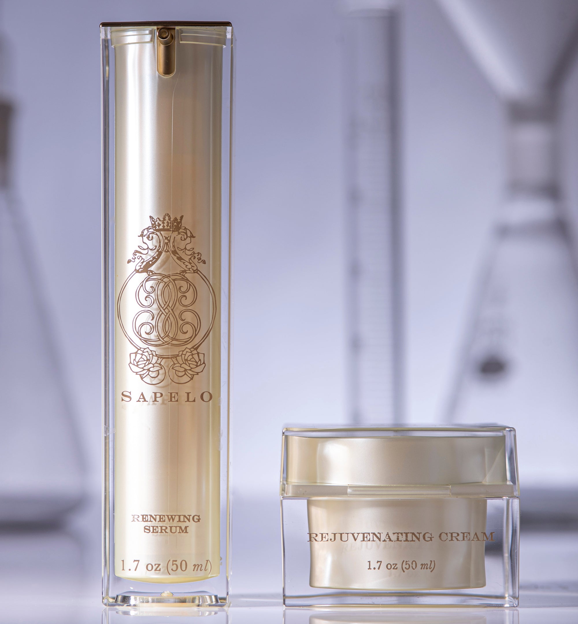 Skincare products with 'Sapelo' branding on a reflective surface.