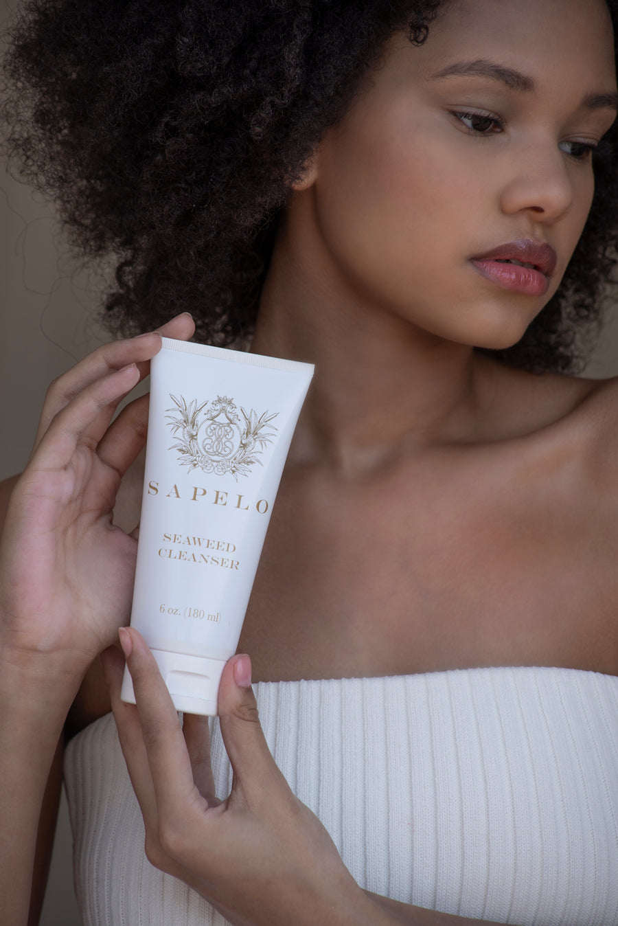 model with sapelo seaweed cleanser