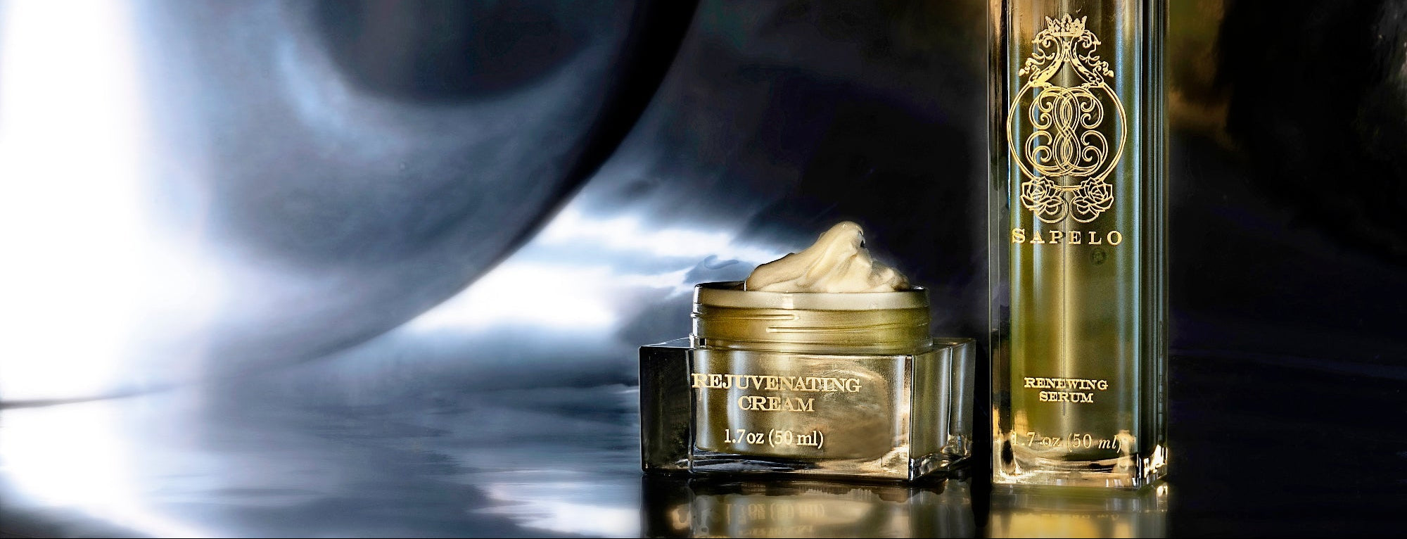 Skincare products with a brand logo on a reflective surface