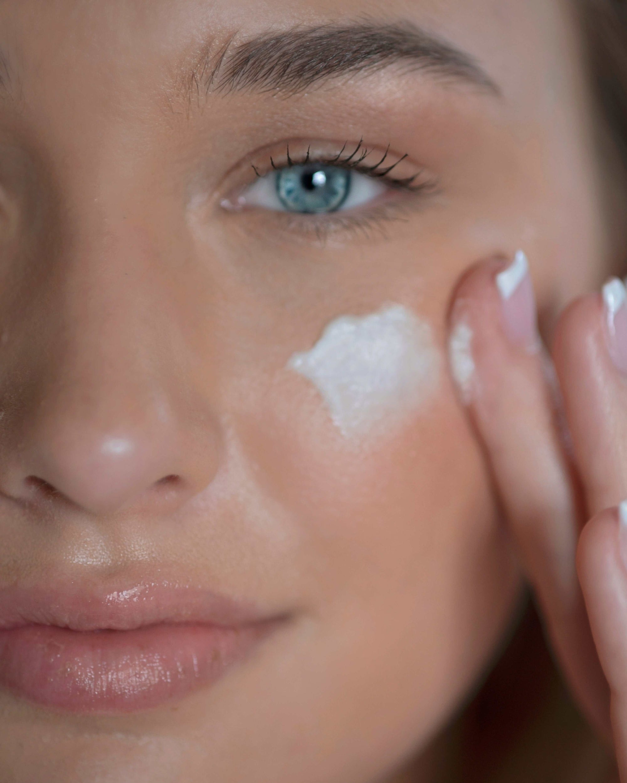 Model with Sapelo Skin Care Renewing Serum & Rejuvenating Cream 