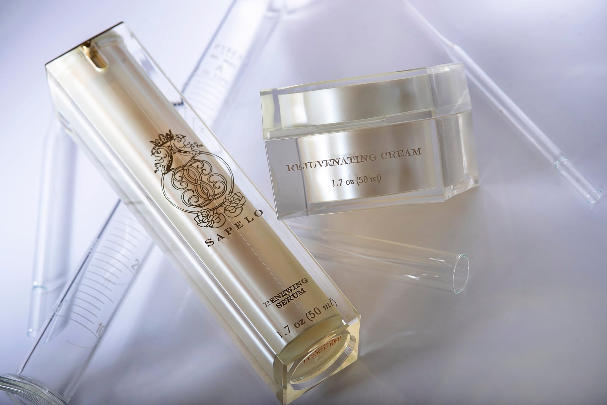 Skincare products including a jar and a tube on a light background